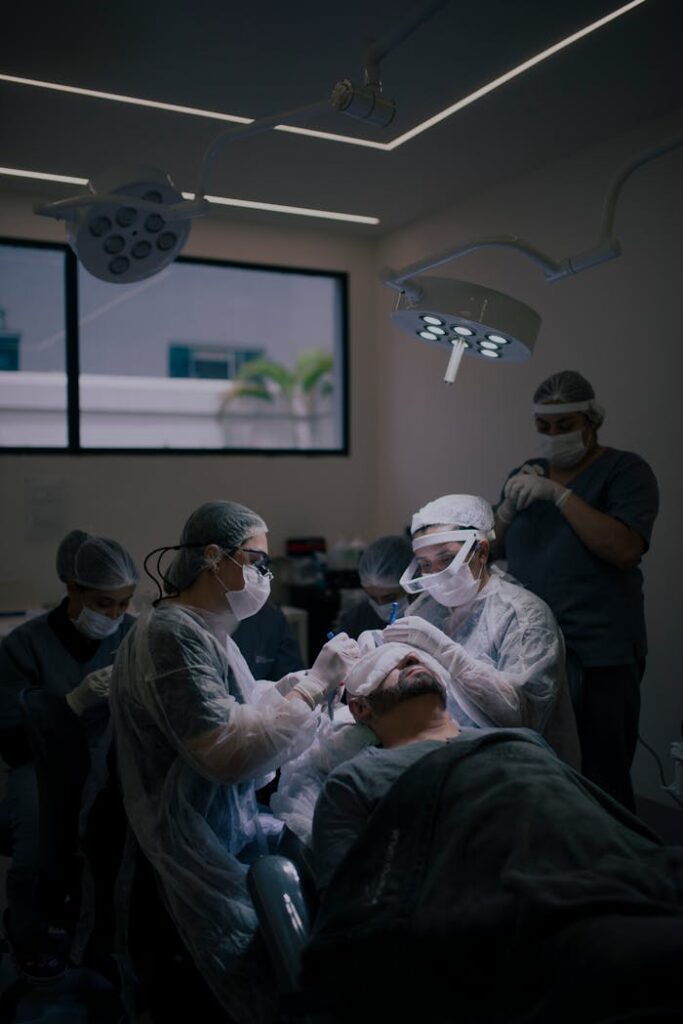 pexels-photo-20845681 Surgeons conduct a hair transplant procedure in a modern operating room.